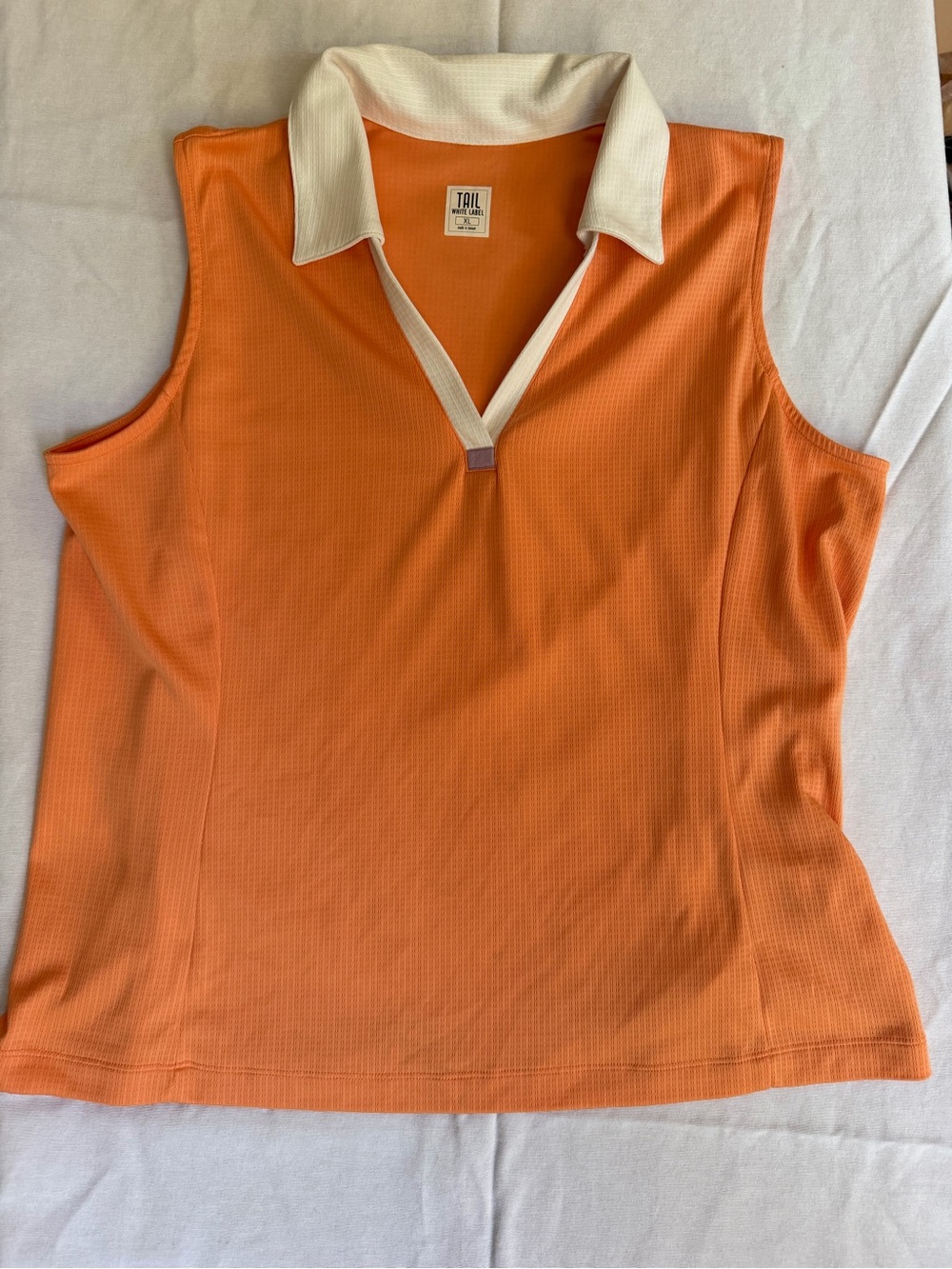 Tail Women's Sleeveless Golf Shirt in Orange